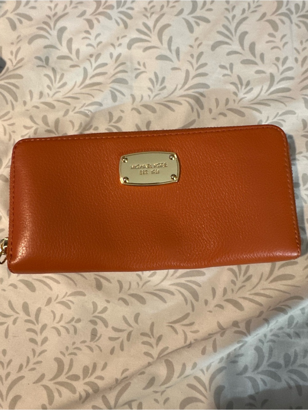 Michael Kors Orange Leather Zip Wallet with Gold Plaque